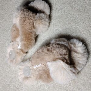 A women's tan and cream faux fur slippers. Mint condition. Size small/medium